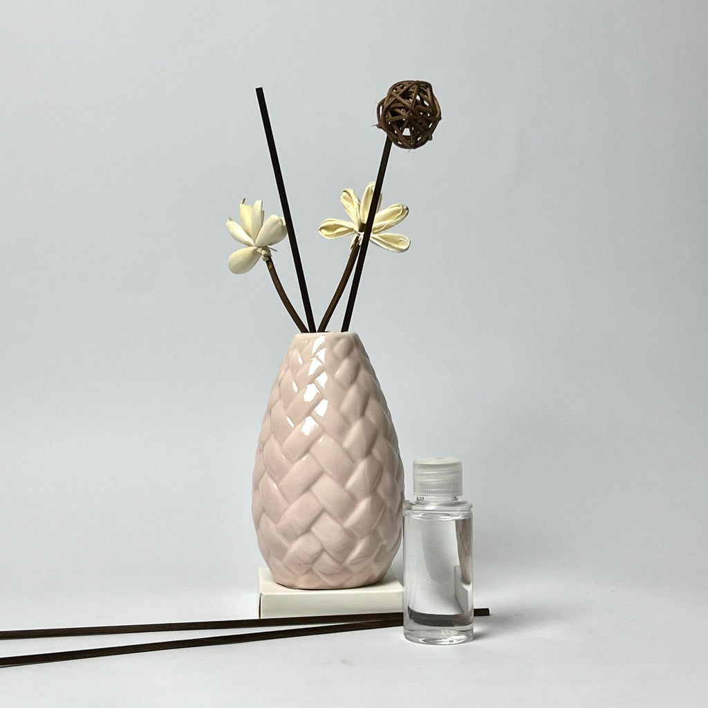 Textured Ceramic Reed Diffuser with Sola Flowers & Rattan Ball Accents